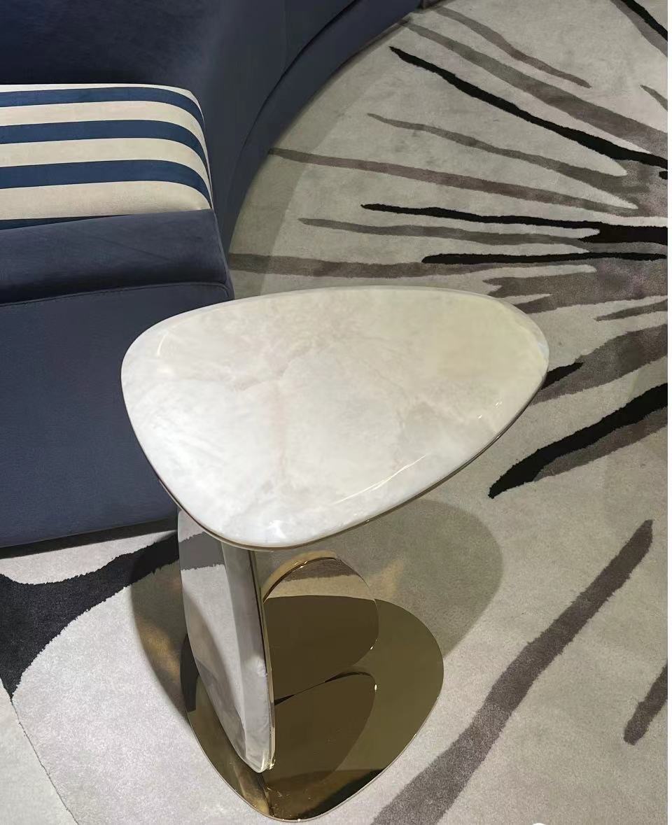 Modern brass end table Modern brass end table